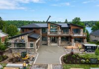 Exterior view of a luxury custom home in Belleville with modern design features